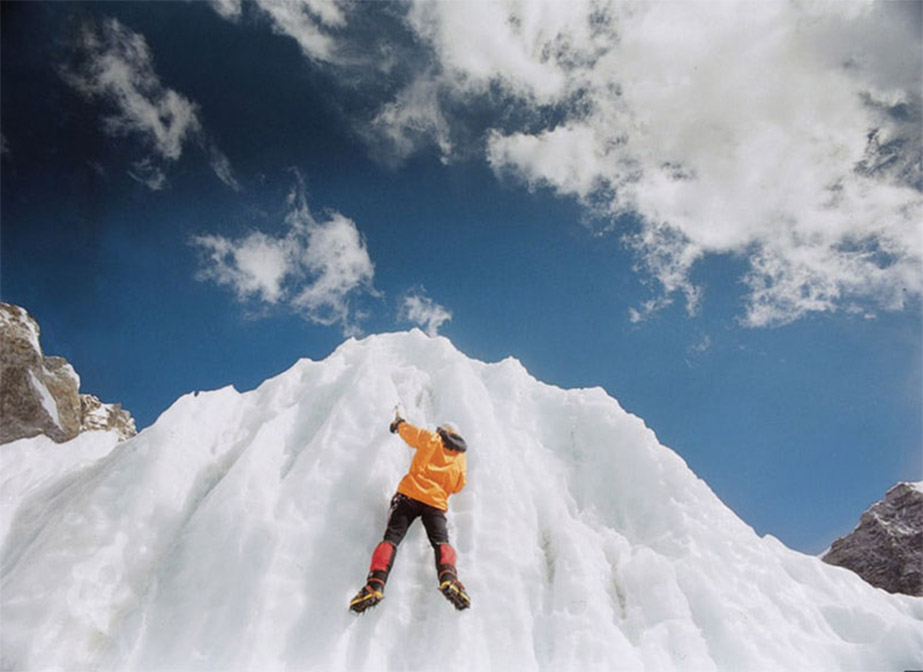 Everest - Hiker scaling ice wall