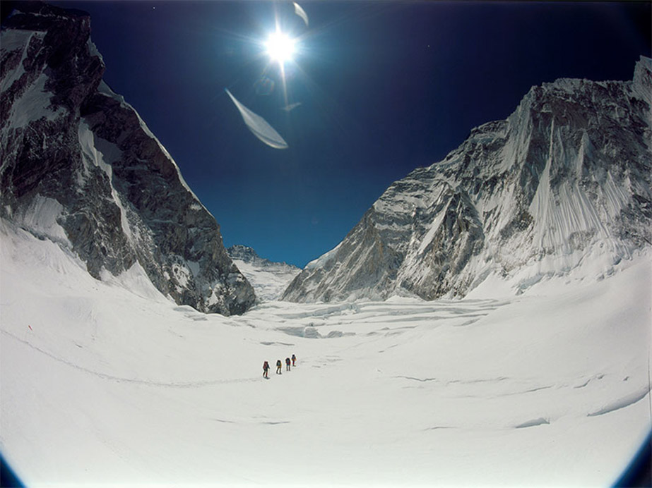 Everest - Hikers walking a trail in the ice